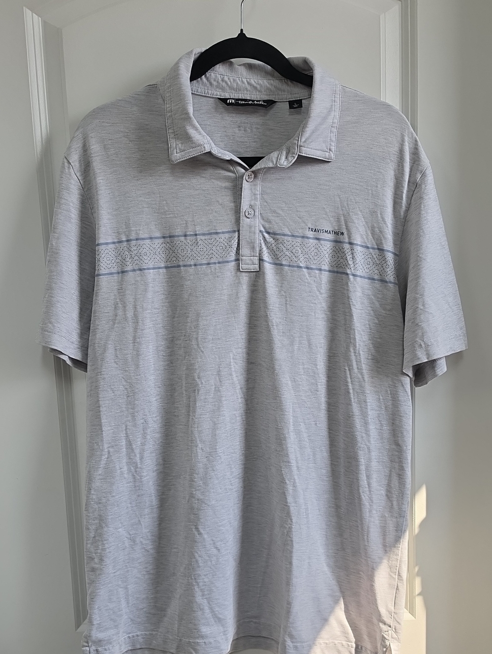 Travis Mathew Light Gray Polo with Subtle Chest Stripe